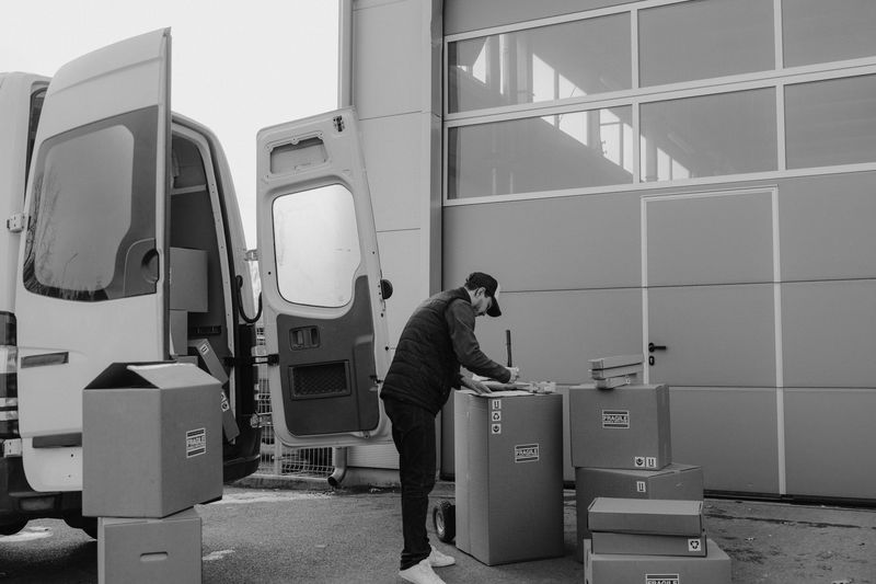 Organized moving boxes and furniture being delivered to a new Stamford apartment