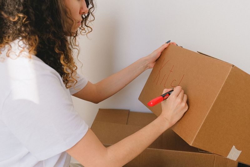 Organized moving boxes inside a clean storage unit